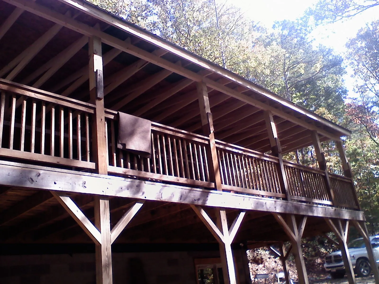Timber framing under a new elevated porch and deck — Roof Leak Repair in Bluffton by Roofing Brothers